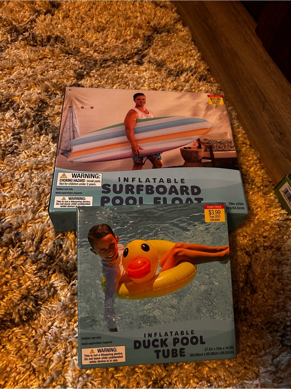 Inflatable Duck Pool Tube and inflatable surfboard pool toy. New. Never opened.